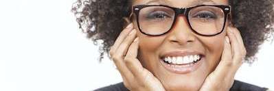 Woman with dental implants smiling in Mt Pleasant, SC