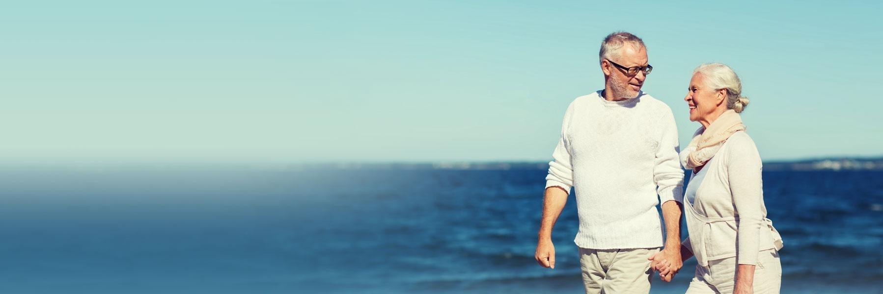 Couple walking along Mt. Pleasant Pier in South Carolina
